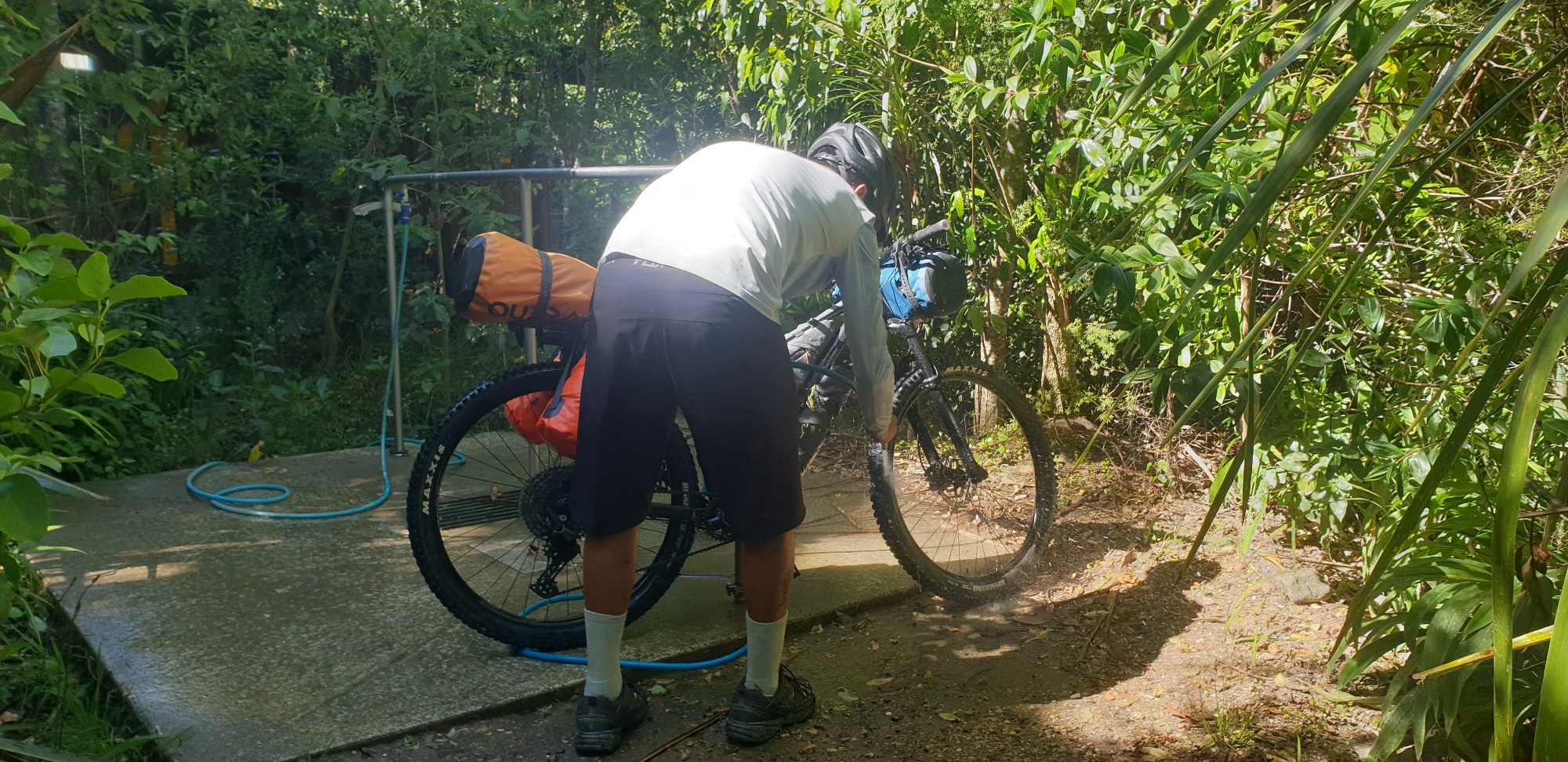 Bike wash at the end of the Queen Charlotte Track by Kate