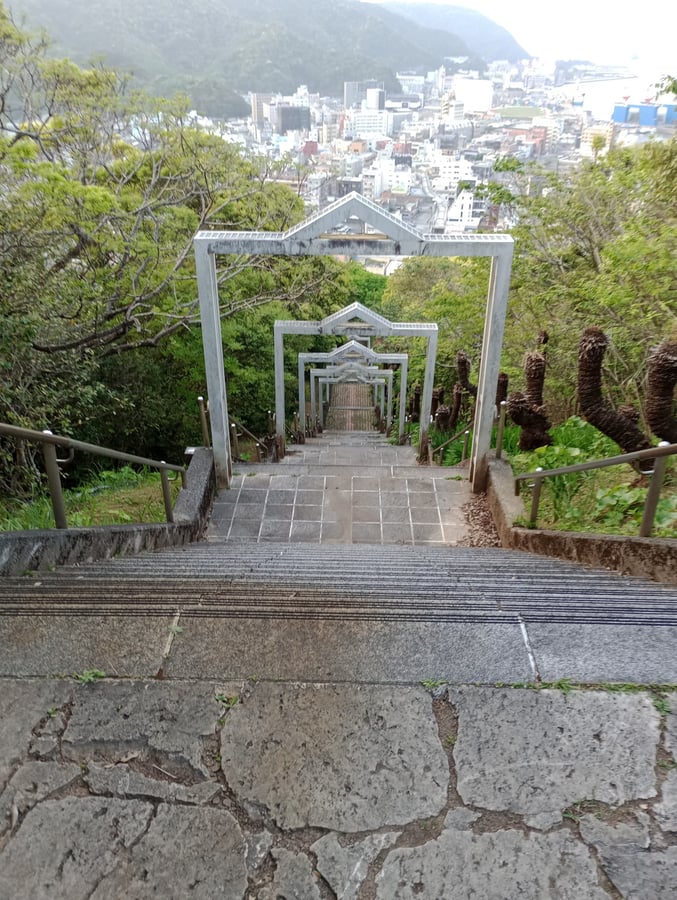 Stop to wander up to a shrine above Naze, Japan